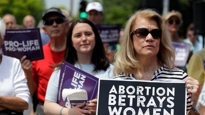 FILE - Anti-abortion supporters gather outside the Planned Parenthood clinic on June 4, 2019, in St. Louis. (AP Photo/Jeff Roberson, File) (AP) FILE - Anti-abortion supporters gather outside the Planned Parenthood clinic on June 4, 2019, in St. Louis. (AP Photo/Jeff Roberson, File) (AP)