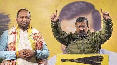 Arvind Kejriwal addresses a public meeting in support of party candidate Deepak Singla (left) in New Delhi on Monday. (PTI) Arvind Kejriwal addresses a public meeting in support of party candidate Deepak Singla (left) in New Delhi on Monday. (PTI)