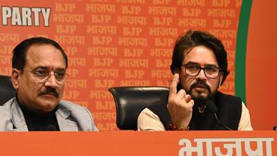 BJP leader Anurag Thakur (right) with Delhi state president Virendra Sachdeva (left) at a press conference at BJP headquarters in New Delhi on Monday. (Arvind Yadav/HT Photo) BJP leader Anurag Thakur (right) with Delhi state president Virendra Sachdeva (left) at a press conference at BJP headquarters in New Delhi on Monday. (Arvind Yadav/HT Photo)