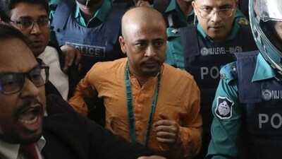 Chinmoy Krishna Das Brahmmachari, the spokesperson for the Bangladesh Sammilit Sanatani Jagran Jote, has requested bail in the high court in the sedition case on the accusation of defaming the country's flag. (ANI) Chinmoy Krishna Das Brahmmachari, the spokesperson for the Bangladesh Sammilit Sanatani Jagran Jote, has requested bail in the high court in the sedition case on the accusation of defaming the country's flag. (ANI)