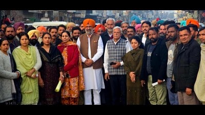 Congress MLA from Shahkot Hardev Singh Laddi Sherowalia along with his councillors staged a protest outside the municipal council office against the district administration over delay in conducting elections to the post of the president of the council. (HT Photo) Congress MLA from Shahkot Hardev Singh Laddi Sherowalia along with his councillors staged a protest outside the municipal council office against the district administration over delay in conducting elections to the post of the president of the council. (HT Photo)