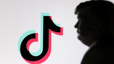 A 3D-printed miniature model of US President-elect Donald Trump and TikTok logo are seen in this illustration taken January 19, 2025. (Reuters)