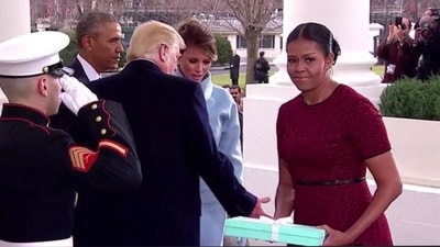 Michelle Obama was caught in an awkward moment when Melania Trump handed her an unexpected gift on Donald Trump's 2017 inauguration. (X/@Mahi_71) Michelle Obama was caught in an awkward moment when Melania Trump handed her an unexpected gift on Donald Trump's 2017 inauguration. (X/@Mahi_71)