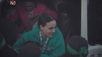 Emily Damari, a 28-year-old freed Hamas captive, lost two fingers in the October 7, 2023, attack on Israel, according to her family. When the British-Israeli national was taken prisoner by Hamas militants, her fingers were blown off. Romi Gonen, age 23, and Doron Steinbrecher, age 31, were also freed with Damari. (via REUTERS)