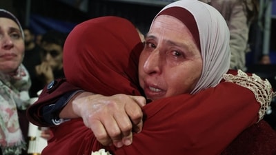  Gaza's Health Ministry reports that approximately 46,000 Palestinians have been killed by Israeli operations. In pic: a Palestinian woman cries as she embraces a loved one who was released from jail along with some 90 prisoners set free by Israel in the early hours of January 20, 2025 in the occupied West Bank town of Beitunia, on the outskirts of Ramallah. (AFP/Zain JAAFAR) Gaza's Health Ministry reports that approximately 46,000 Palestinians have been killed by Israeli operations. In pic: a Palestinian woman cries as she embraces a loved one who was released from jail along with some 90 prisoners set free by Israel in the early hours of January 20, 2025 in the occupied West Bank town of Beitunia, on the outskirts of Ramallah. (AFP/Zain JAAFAR)