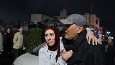 Ninety percent of Gaza's population is estimated to have been displaced by the conflict, with several areas having been reduced to rubble. In pic: a Palestinian man embraces a loved one who was released from jail along with some 90 prisoners set free by Israel in the early hours of January 20, 2025 in the occupied West Bank town of Beitunia, on the outskirts of Ramallah. (AFP) Ninety percent of Gaza's population is estimated to have been displaced by the conflict, with several areas having been reduced to rubble. In pic: a Palestinian man embraces a loved one who was released from jail along with some 90 prisoners set free by Israel in the early hours of January 20, 2025 in the occupied West Bank town of Beitunia, on the outskirts of Ramallah. (AFP)