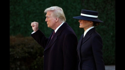 President-elect Donald Trump gestures as he walks with his wife Melania after a church service at St. John's Episcopal Church across from the White House in Washington, Monday, Jan. 20, 2025, on Donald Trump's inauguration day. (AP Photo/Matt Rourke) (AP) President-elect Donald Trump gestures as he walks with his wife Melania after a church service at St. John's Episcopal Church across from the White House in Washington, Monday, Jan. 20, 2025, on Donald Trump's inauguration day. (AP Photo/Matt Rourke) (AP)