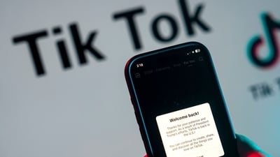 A message welcoming users back and thanking US President-elect Donald Trump on the TikTok app on a smartphone arranged in Arlington, Virginia, US, on Sunday. (Bloomberg) A message welcoming users back and thanking US President-elect Donald Trump on the TikTok app on a smartphone arranged in Arlington, Virginia, US, on Sunday. (Bloomberg)