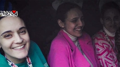 With the release of three hostages from Gaza and the first group of 90 Palestinian inmates from Israeli detention, the truce between Israel and Hamas has overcome its first major obstacle. In pic: the three Israeli hostages (L to R) Emily Damari, Romi Gonen, and Doron Steinbracher, sitting in a Hamas vehicle before being released to the Red Cross. (AFP Photo) With the release of three hostages from Gaza and the first group of 90 Palestinian inmates from Israeli detention, the truce between Israel and Hamas has overcome its first major obstacle. In pic: the three Israeli hostages (L to R) Emily Damari, Romi Gonen, and Doron Steinbracher, sitting in a Hamas vehicle before being released to the Red Cross. (AFP Photo)