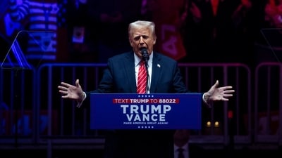 US President-elect Donald Trump speaks during a rally at Capital One Arena ahead of the 60th presidential inauguration in Washington, DC, US, on Sunday, Jan. 19, 2025. Monday's presidential inauguration promises to be one of the coldest on record, prompting US officials to move the ceremony indoors to the Capitol Rotunda. (Bloomberg) US President-elect Donald Trump speaks during a rally at Capital One Arena ahead of the 60th presidential inauguration in Washington, DC, US, on Sunday, Jan. 19, 2025. Monday's presidential inauguration promises to be one of the coldest on record, prompting US officials to move the ceremony indoors to the Capitol Rotunda. (Bloomberg)