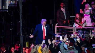 US President-elect Donald Trump, center, arrives for a rally at Capital One Arena ahead of the 60th presidential inauguration in Washington, DC, US, on Sunday, Jan. 19, 2025. (Bloomberg) US President-elect Donald Trump, center, arrives for a rally at Capital One Arena ahead of the 60th presidential inauguration in Washington, DC, US, on Sunday, Jan. 19, 2025. (Bloomberg)