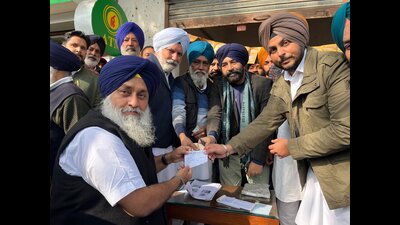 The Shiromani Akali Dal initiated its new membership drive from Muktsar on Monday with senior leader Sukhbir Singh Badal receiving the first membership slip at Badal village. He received the slip from a local leader. (HT) The Shiromani Akali Dal initiated its new membership drive from Muktsar on Monday with senior leader Sukhbir Singh Badal receiving the first membership slip at Badal village. He received the slip from a local leader. (HT)