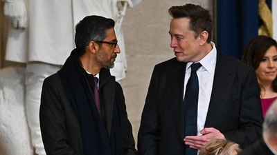 Google CEO Sundar Pichai and Tesla CEO Elon Musk arrives ahead of the 60th inaugural ceremony where Donald Trump will be sworn in as the 47th president on January 20, 2025, in the US Capitol Rotunda in Washington, DC. (Photo by Ricky Carioti / POOL / AFP) (AFP) Google CEO Sundar Pichai and Tesla CEO Elon Musk arrives ahead of the 60th inaugural ceremony where Donald Trump will be sworn in as the 47th president on January 20, 2025, in the US Capitol Rotunda in Washington, DC. (Photo by Ricky Carioti / POOL / AFP) (AFP)