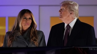 STERLING, VIRGINIA - JANUARY 18: U.S. President-elect Donald Trump and his wife Melania Trump attend a private party and fireworks show at Trump National Golf Club on January 18, 2025 in Sterling, Virginia. Melania wore a grey Dior coat and a Dolce & Gabbana pantsuit. Andrew Harnik/Getty Images/AFP (Photo by Andrew Harnik / GETTY IMAGES NORTH AMERICA / Getty Images via AFP) (Getty Images via AFP) STERLING, VIRGINIA - JANUARY 18: U.S. President-elect Donald Trump and his wife Melania Trump attend a private party and fireworks show at Trump National Golf Club on January 18, 2025 in Sterling, Virginia. Melania wore a grey Dior coat and a Dolce & Gabbana pantsuit. Andrew Harnik/Getty Images/AFP (Photo by Andrew Harnik / GETTY IMAGES NORTH AMERICA / Getty Images via AFP) (Getty Images via AFP)