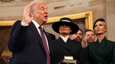 Donald Trump takes the oath of office as his wife Melania and his children look on during inauguration ceremonies in the Rotunda of the U.S. Capitol on January 20, 2025 in Washington, (via REUTERS)