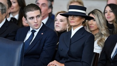 Barron Trump and First Lady Melania Trump listen as US President Donald Trump delivers remarks after being sworn in as the 47th President. (REUTERS)