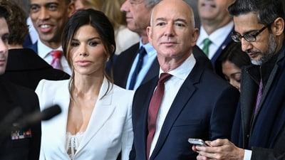 Lauren Sanchez with fiance and Amazon founder Jeff Bezos at Donald Trump's inauguration. (via REUTERS)