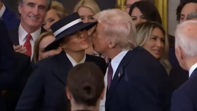 Donald Trump and Melania Trump shared a awkward moment as they kissed at the inauguration day. (X/@MELANIAJTRUMP) Donald Trump and Melania Trump shared a awkward moment as they kissed at the inauguration day. (X/@MELANIAJTRUMP)