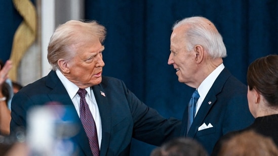 President-elect Donald J. Trump and President Joe Biden attend inauguration of Donald Trump as the 47th president of the United States takes place inside the Capitol Rotunda of the U.S. Capitol building in Washington, D.C., Monday, January 20, 2025. It is the 60th U.S. presidential inauguration and the second non-consecutive inauguration of Trump as U.S. president. (Photo by Kenny Holston/The New York Times / POOL / AFP) (AFP)