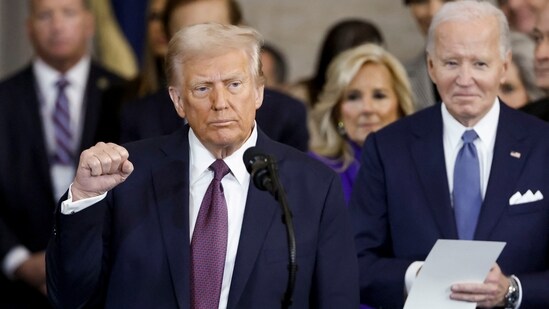 US President Donald Trump gestures during his inauguration ceremony in the rotunda of the United States Capitol in Washington, DC. (AFP)