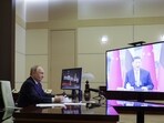 Russian President Vladimir Putin speaks with Chinese President Xi Jinping via videoconference at Novo-Ogaryovo state residence outside of Moscow, Russia, Tuesday, Jan. 21, 2025.