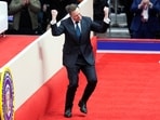 Elon Musk jumping on stage to speak at an indoor Presidential Inauguration parade event in Washington, Monday, Jan. 20, 2025. (AP Photo/Susan Walsh) Elon Musk jumping on stage to speak at an indoor Presidential Inauguration parade event in Washington, Monday, Jan. 20, 2025. (AP Photo/Susan Walsh)
