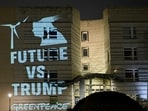A view shows a protest projection set up by Greenpeace activists onto the wall of the U.S. Embassy in Berlin against Trump's withdrawal from the Paris Climate Agreement, in Berlin, Germany January 21. (REUTERS) 