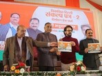 BJP MPs Anurag Thakur, Ramvir Singh Bidhuri, and Manoj Tiwari with Delhi party President Virendra Sachdeva, and party leader Vijender Gupta during the launch of the second part of the party's 'Sankalp Patra' (manifesto) for the upcoming Delhi Assembly elections(PTI)
