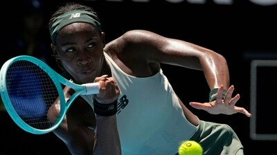 Coco Gauff of the U.S. plays a forehand return to Paula Badosa of Spain during their quarterfinal match at the Australian Open tennis championship in Melbourne, Australia, Tuesday, Jan. 21, 2025. (AP Photo/Manish Swarup) (AP) Coco Gauff of the U.S. plays a forehand return to Paula Badosa of Spain during their quarterfinal match at the Australian Open tennis championship in Melbourne, Australia, Tuesday, Jan. 21, 2025. (AP Photo/Manish Swarup) (AP)