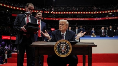The US President Donald Trump gestures on the day he signs the freedom of speech executive order during the inaugural parade inside Capital One Arena on the inauguration day of his second presidential term, in Washington. (REUTERS)