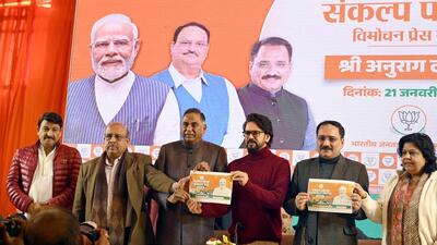 BJP MPs Anurag Thakur, Ramvir Singh Bidhuri, and Manoj Tiwari with Delhi party President Virendra Sachdeva, and party leader Vijender Gupta during the launch of the second part of the party's 'Sankalp Patra' (manifesto) for the upcoming Delhi Assembly elections on Tuesday. (Arvind Yadav/HT PHOTO) BJP MPs Anurag Thakur, Ramvir Singh Bidhuri, and Manoj Tiwari with Delhi party President Virendra Sachdeva, and party leader Vijender Gupta during the launch of the second part of the party's 'Sankalp Patra' (manifesto) for the upcoming Delhi Assembly elections on Tuesday. (Arvind Yadav/HT PHOTO)