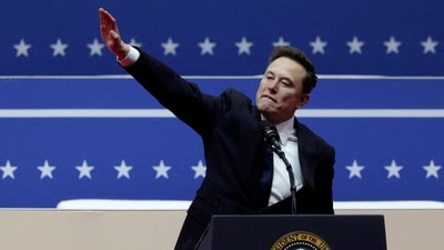 FILE PHOTO: Elon Musk gestures at the podium inside the Capital One arena on the inauguration day of Donald Trump's second presidential term, in Washington. (Mike Segar/Reuters)