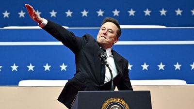 Elon Musk gestures as he speaks during the inaugural parade inside Capitol One Arena, in Washington, DC, on January 20, 2025. Musk's hand gestures at an inauguration event for US President Donald Trump quickly drew comparisons to Nazi salutes. (AFP) Elon Musk gestures as he speaks during the inaugural parade inside Capitol One Arena, in Washington, DC, on January 20, 2025. Musk's hand gestures at an inauguration event for US President Donald Trump quickly drew comparisons to Nazi salutes. (AFP)