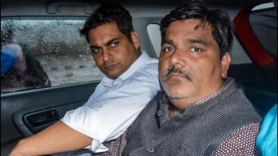 Former AAP councillor Tahir Hussain (right) after his arrest on March 6, 2020. (PTI File Photo)
