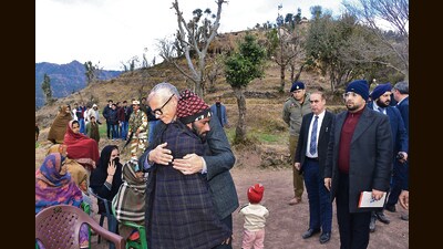 J&K chief minister Omar Abdullah meeting the bereaved families in Rajouri’s Badhaal village on Tuesday. (Source: X) J&K chief minister Omar Abdullah meeting the bereaved families in Rajouri’s Badhaal village on Tuesday. (Source: X)