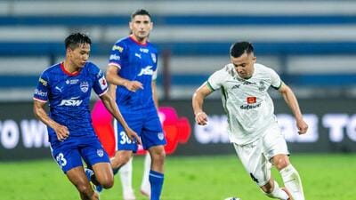 Mirjalol Kasimov of Mohammedan Sporting Club and Lalremtluanga Fanai of Bengaluru FC at the Sree Kanteerava Stadium, Bengaluru. (ISL) Mirjalol Kasimov of Mohammedan Sporting Club and Lalremtluanga Fanai of Bengaluru FC at the Sree Kanteerava Stadium, Bengaluru. (ISL)