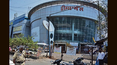 Mumbai, India - March 27, 2021: Police are seen investigating outside the Dreams Mall the next day of the fire in Bhandup, Mumbai, India, on Saturday, March 27, 2021. ( Praful Gangurde / HT Photo ) (HT PHOTO) Mumbai, India - March 27, 2021: Police are seen investigating outside the Dreams Mall the next day of the fire in Bhandup, Mumbai, India, on Saturday, March 27, 2021. ( Praful Gangurde / HT Photo ) (HT PHOTO)