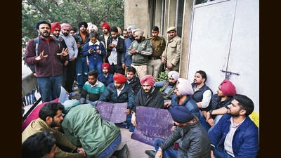 Protesters locked the first floor of the dean students welfare (DSW) office building at the Student Centre in Panjab University, Chandigarh, on Tuesday. (Sanjeev Sharma/HT) Protesters locked the first floor of the dean students welfare (DSW) office building at the Student Centre in Panjab University, Chandigarh, on Tuesday. (Sanjeev Sharma/HT)