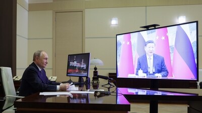 Russian President Vladimir Putin speaks with Chinese President Xi Jinping via videoconference at Novo-Ogaryovo state residence outside of Moscow, Russia, Tuesday, Jan. 21, 2025. (AP)