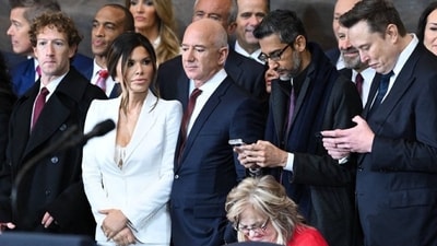 Elon Musk and Sundar Pichai looking at thier phones. (Screengrab) Elon Musk and Sundar Pichai looking at thier phones. (Screengrab)
