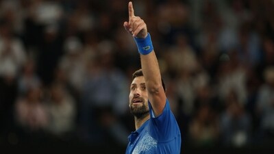 Serbia's Novak Djokovic gestures to the crowd after winning the third set during his men's singles quarterfinal match against Spain's Carlos Alcaraz on day ten of the Australian Open tennis tournament in Melbourne (AFP) Serbia's Novak Djokovic gestures to the crowd after winning the third set during his men's singles quarterfinal match against Spain's Carlos Alcaraz on day ten of the Australian Open tennis tournament in Melbourne (AFP)