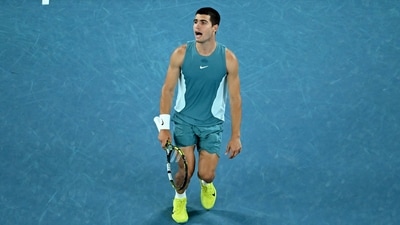 Spain's Carlos Alcaraz was livid with himself on several occasions as he looked clueless on how to beat Novak Djokovic who controlled the last three sets to outclass him. (REUTERS)