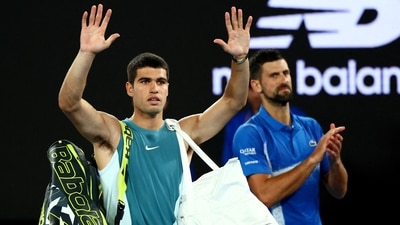 Spain's Carlos Alcaraz reacts after losing his quarter final match against Serbia's Novak Djokovic (REUTERS)