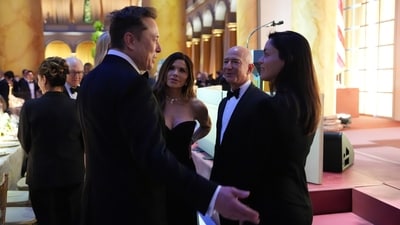 Elon Musk and Shivon Zilis in talks with Jeff Bezos and his wife MacKenzie Scott at Donald Trump's pre-inauguration dinner. (AP) Elon Musk and Shivon Zilis in talks with Jeff Bezos and his wife MacKenzie Scott at Donald Trump's pre-inauguration dinner. (AP)