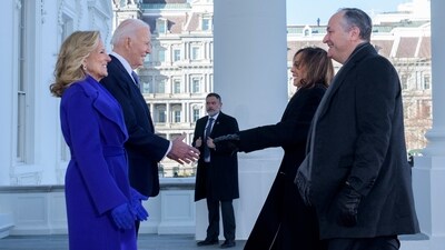 President Joe Biden and first lady Jill Biden greet Vice President Kamala Harris and second gentleman Doug Emhoff on the North Portico of the White House at the White House in Washington. Jill's outfit for Donald Trump’s inauguration on Monday was symbolic. Joining her husband, now ex-President Biden, to welcome the incoming administration, Jill opted for a monochromatic Ralph Lauren ensemble in a bold purple shade. The colour often symbolises a bipartisan union in American politics. (AP) President Joe Biden and first lady Jill Biden greet Vice President Kamala Harris and second gentleman Doug Emhoff on the North Portico of the White House at the White House in Washington. Jill's outfit for Donald Trump’s inauguration on Monday was symbolic. Joining her husband, now ex-President Biden, to welcome the incoming administration, Jill opted for a monochromatic Ralph Lauren ensemble in a bold purple shade. The colour often symbolises a bipartisan union in American politics. (AP)
