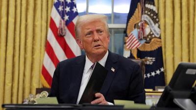 US President Donald Trump signs documents as he issues executive orders in the Oval Office at the White House on Inauguration Day in Washington, on January 20. (REUTERS) US President Donald Trump signs documents as he issues executive orders in the Oval Office at the White House on Inauguration Day in Washington, on January 20. (REUTERS)
