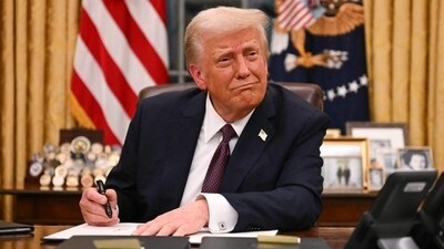 US President Donald Trump signs executive orders in the Oval Office of the White House in Washington, DC, on January 20. (AFP) US President Donald Trump signs executive orders in the Oval Office of the White House in Washington, DC, on January 20. (AFP)