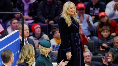 Tiffany Trump wore a black velvet coat dress at her father Donald Trump’s inauguration as the 47th President of the United States in Washington DC on Monday. Her dress was cinched at the waist. (REUTERS)