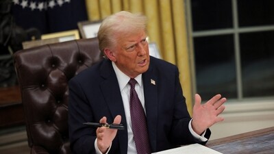 US President Donald Trump speaks on the day he signs documents as he issues executive orders and pardons for January 6 defendants in the Oval Office at the White House on Inauguration Day in Washington (REUTERS)