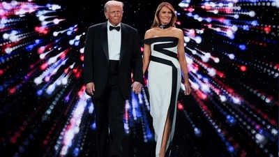 Melania styled the ensemble with white pumps, a black choker necklace adorned with a crystal-adorned brooch, and a statement diamond ring. She left her tresses loose in a side parting, styled with soft blowout waves. For the glam, she chose nude nails, glossy pink lip shade, shimmery muted smokey eyes, mascara-adorned lashes, feathered brows, blushed cheeks, and glowing highlighter.&nbsp; (REUTERS)